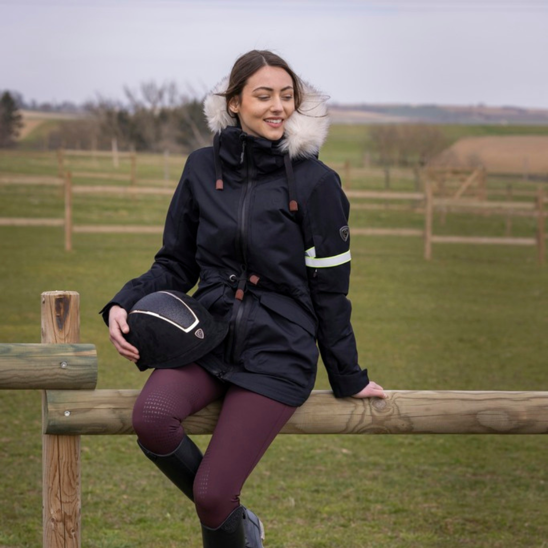 warm and cosy equestrian jacket with faux fur hood trim