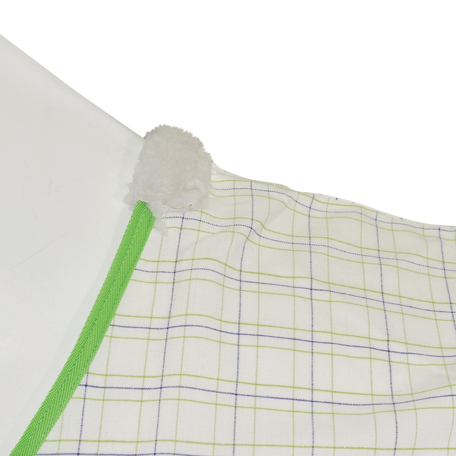 Side view of cotton rug with green lining.